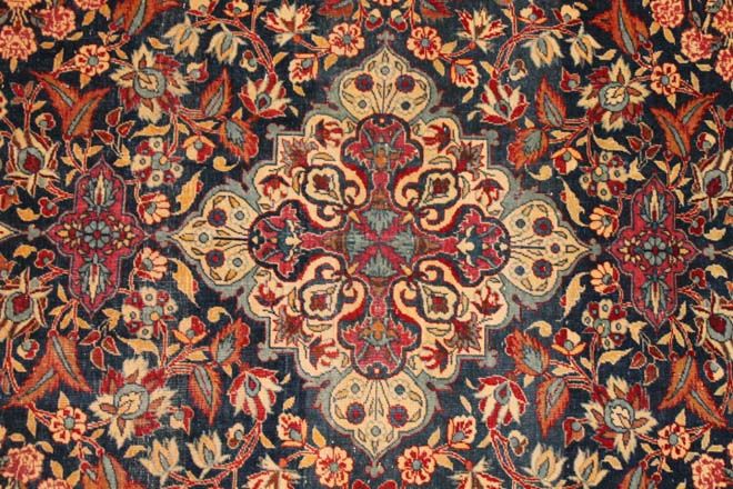 Antique Kashan rug
