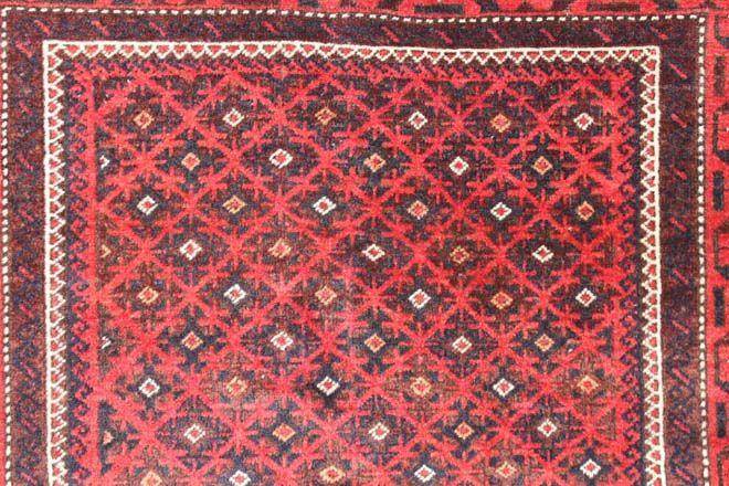 Antique Baluch rug