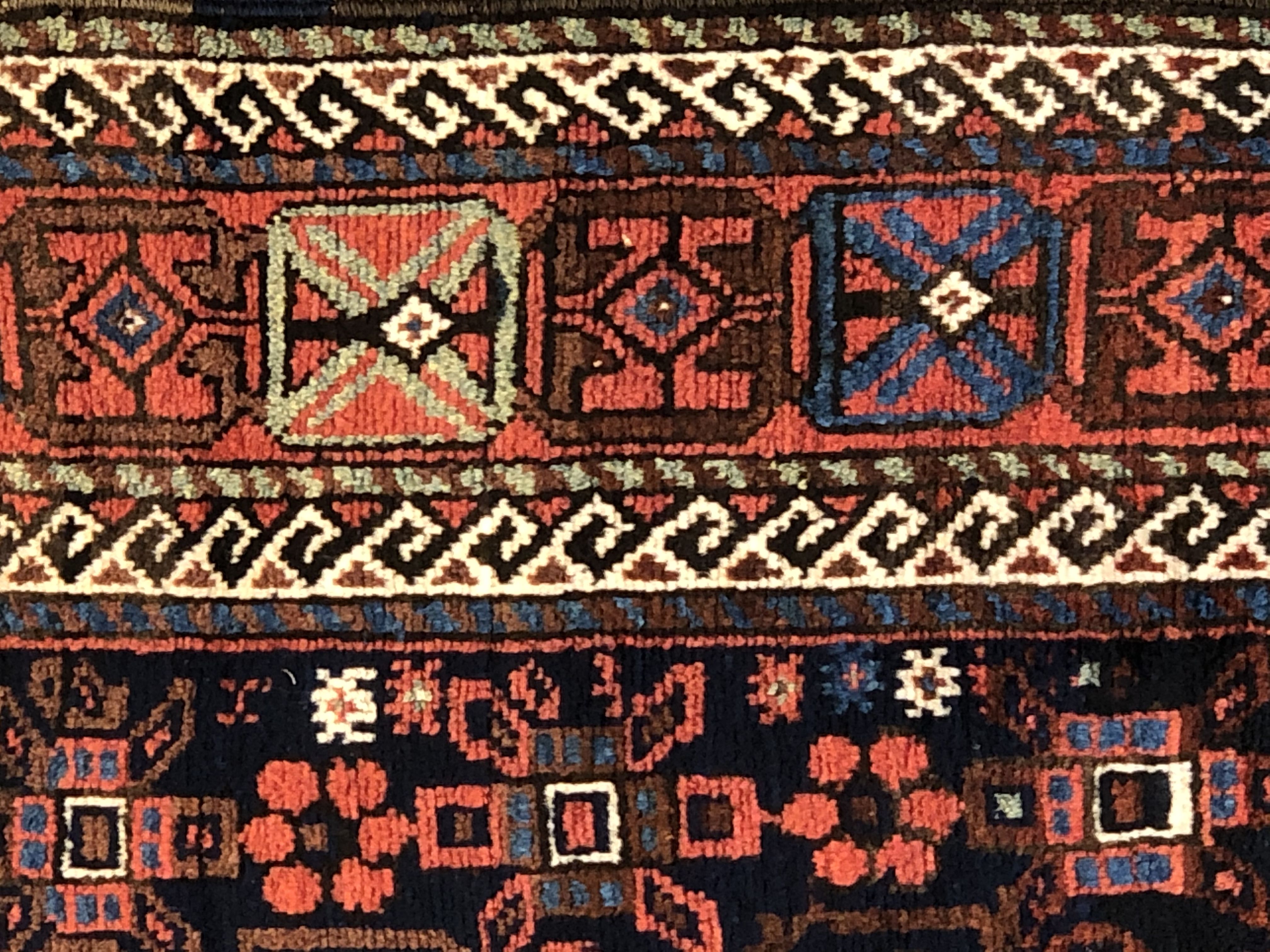 Antique Baluch rug