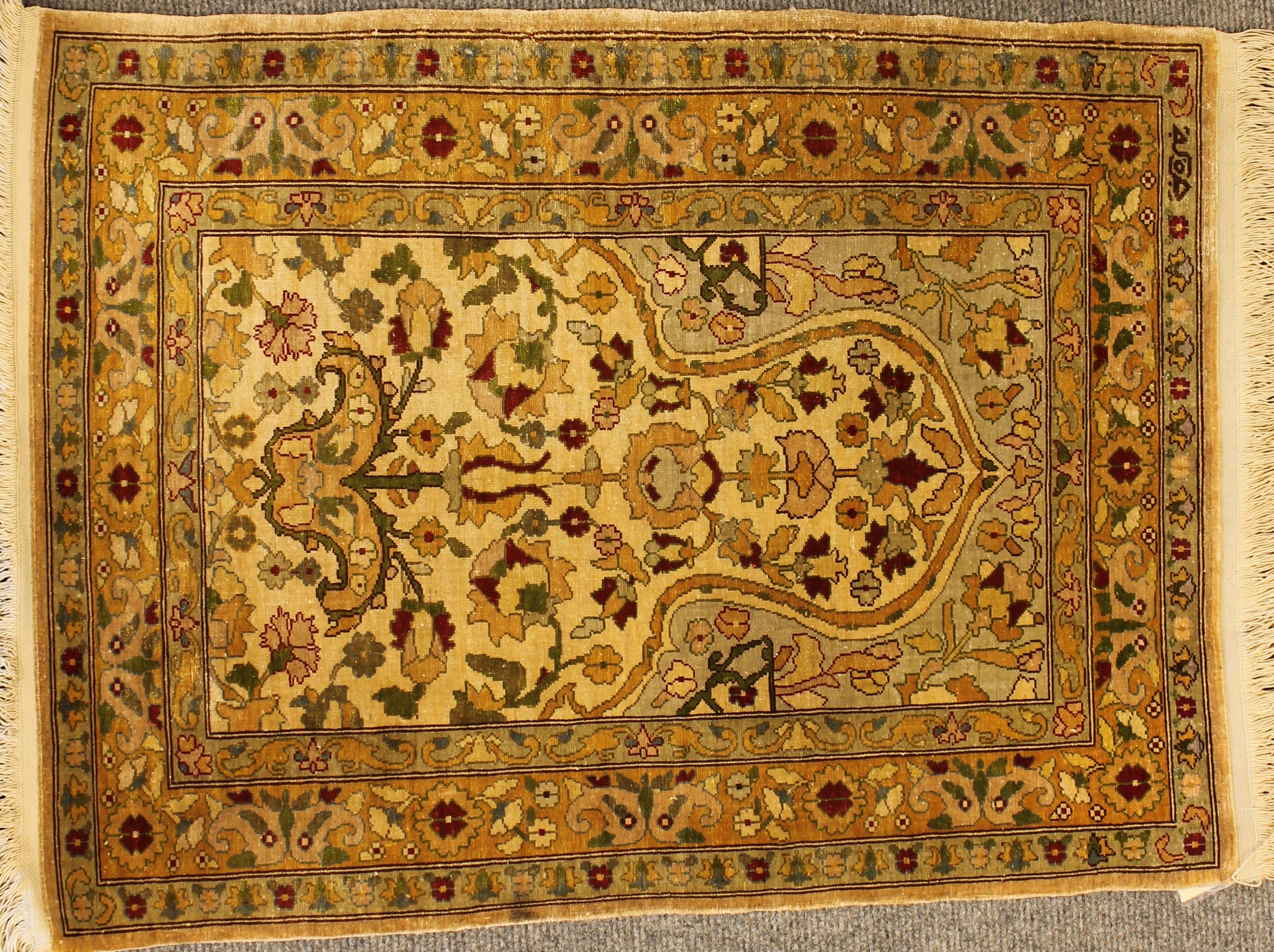 Antique Silk Hereke rug