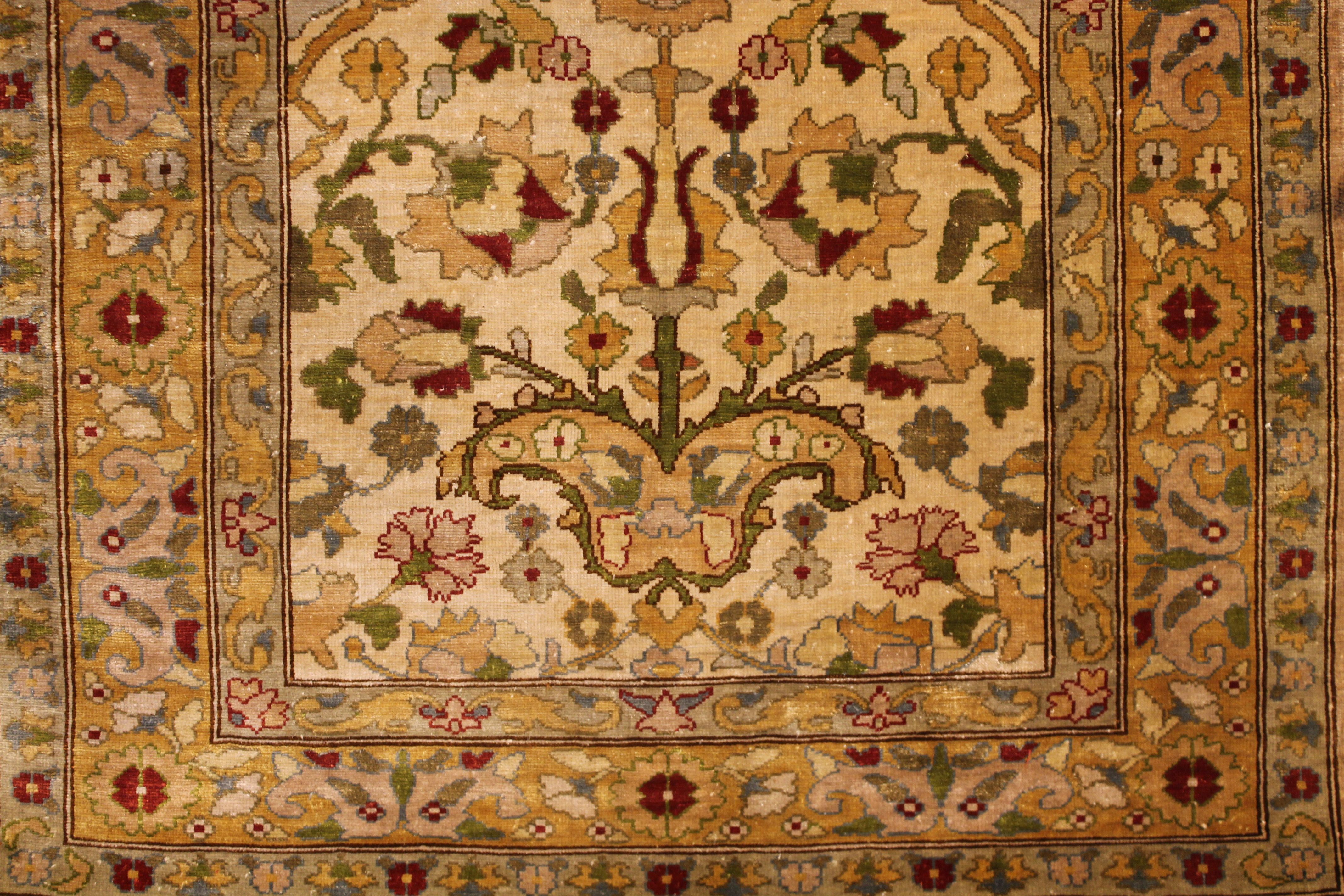 Antique Silk Hereke rug