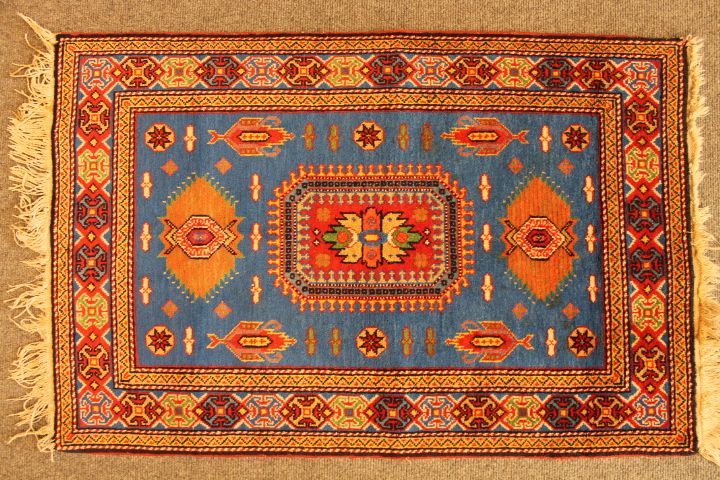 Old caucasian rug