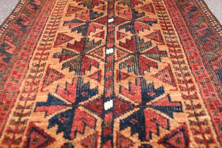 Antique Baluch rug