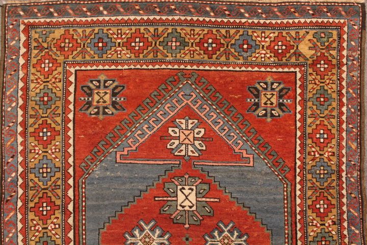 Antique Kazak rug