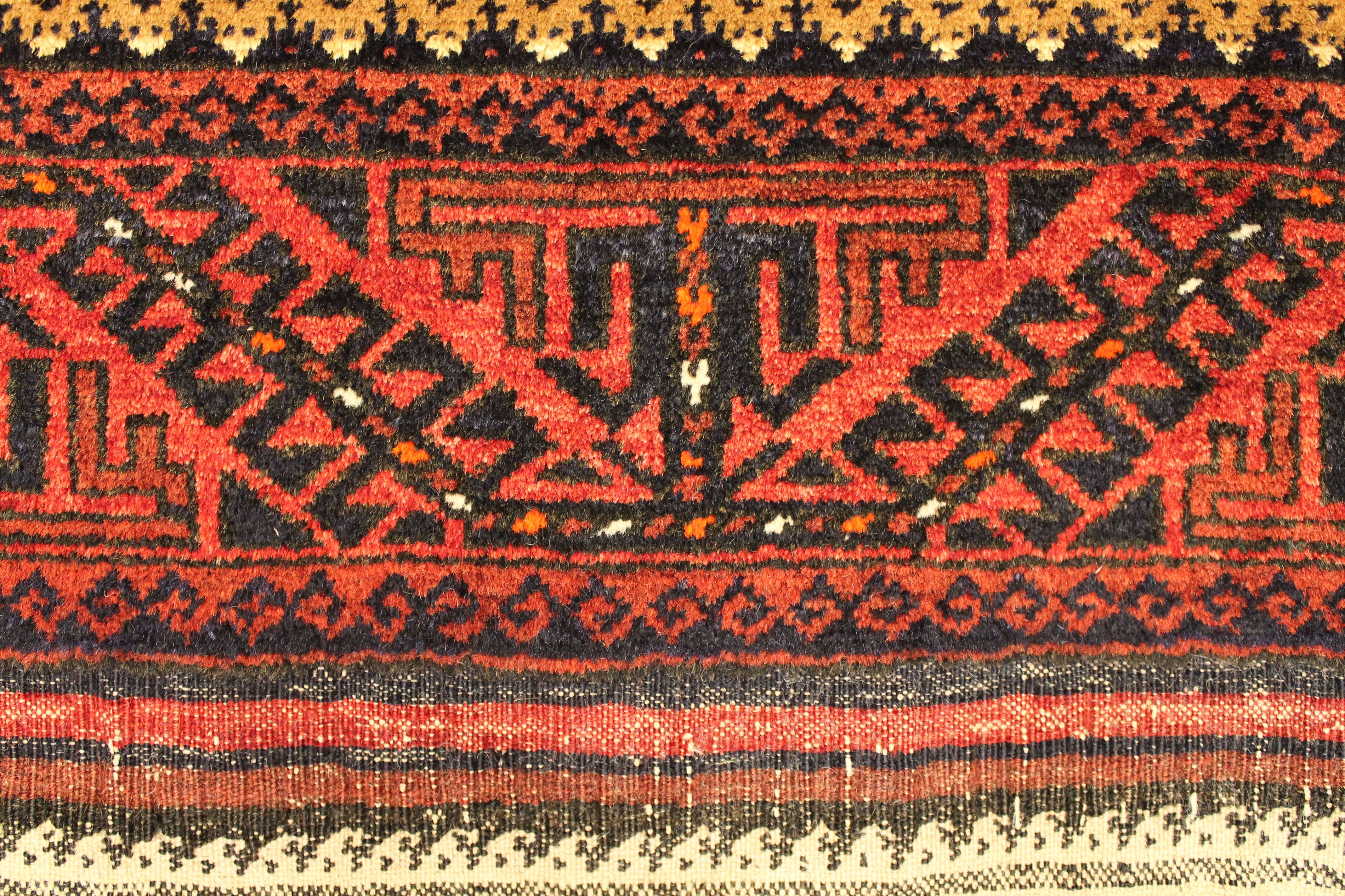 Antique Baluch rug
