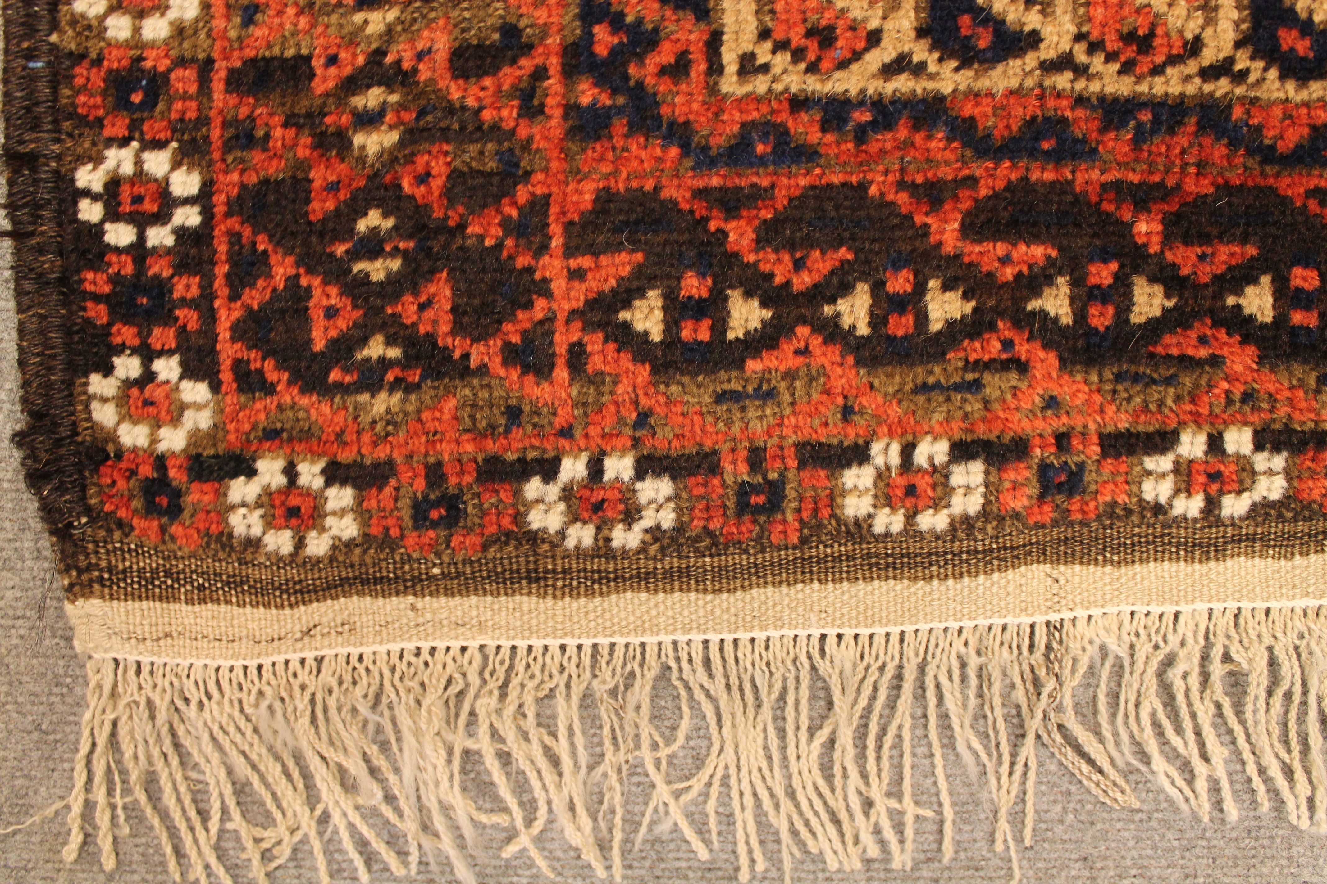 Antique Baluch rug