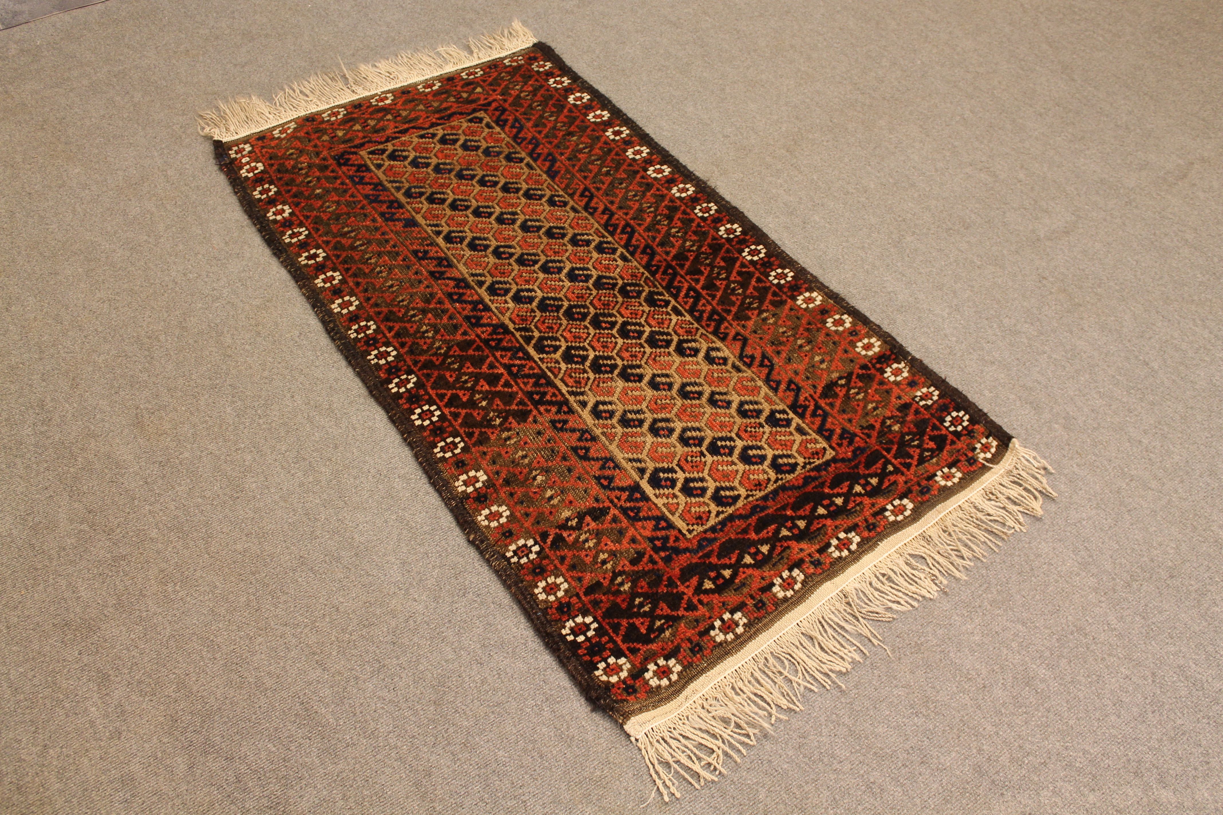 Antique Baluch rug