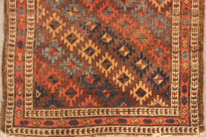 Antique Baluch rug