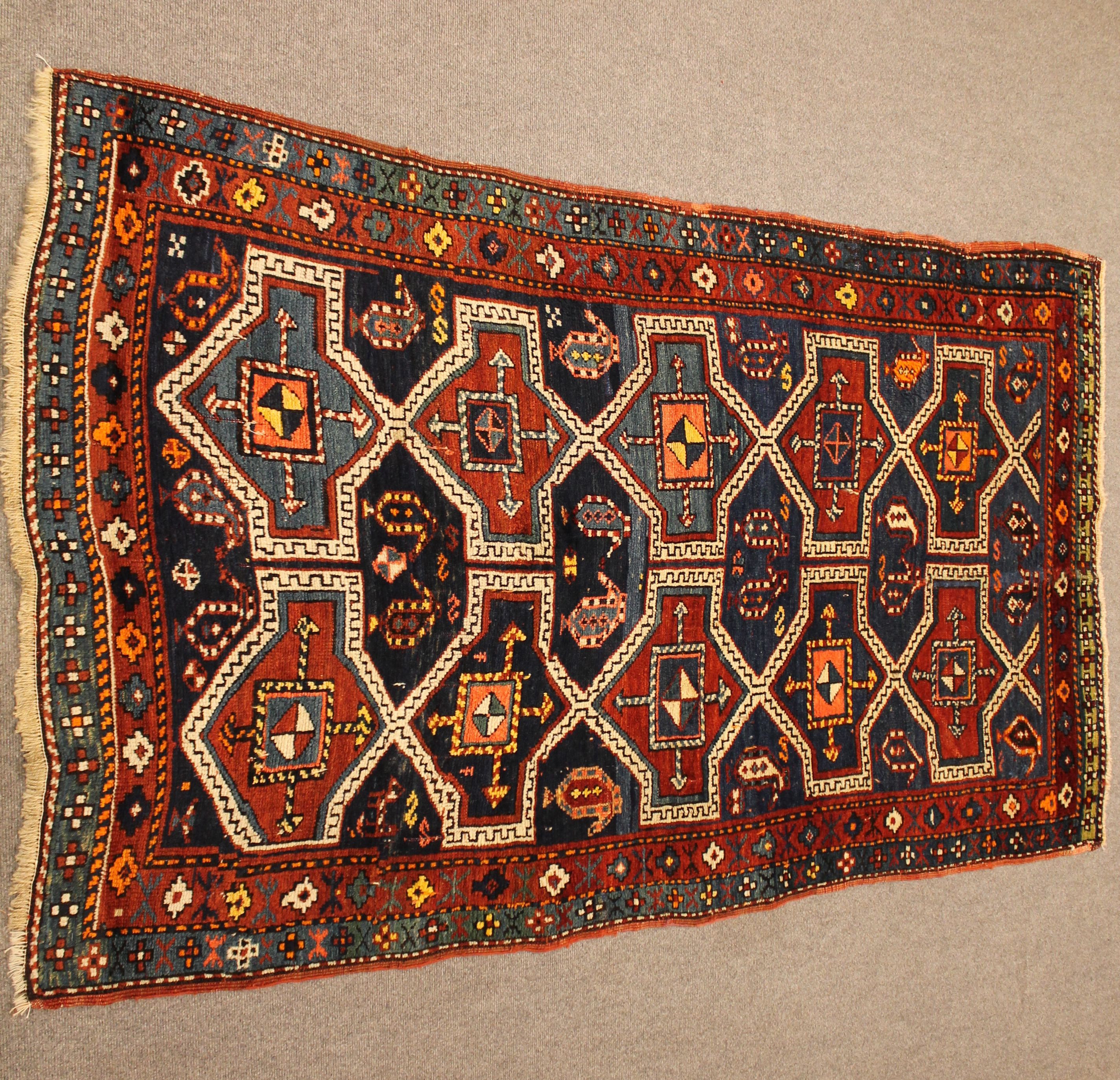 Antique Kazak rug