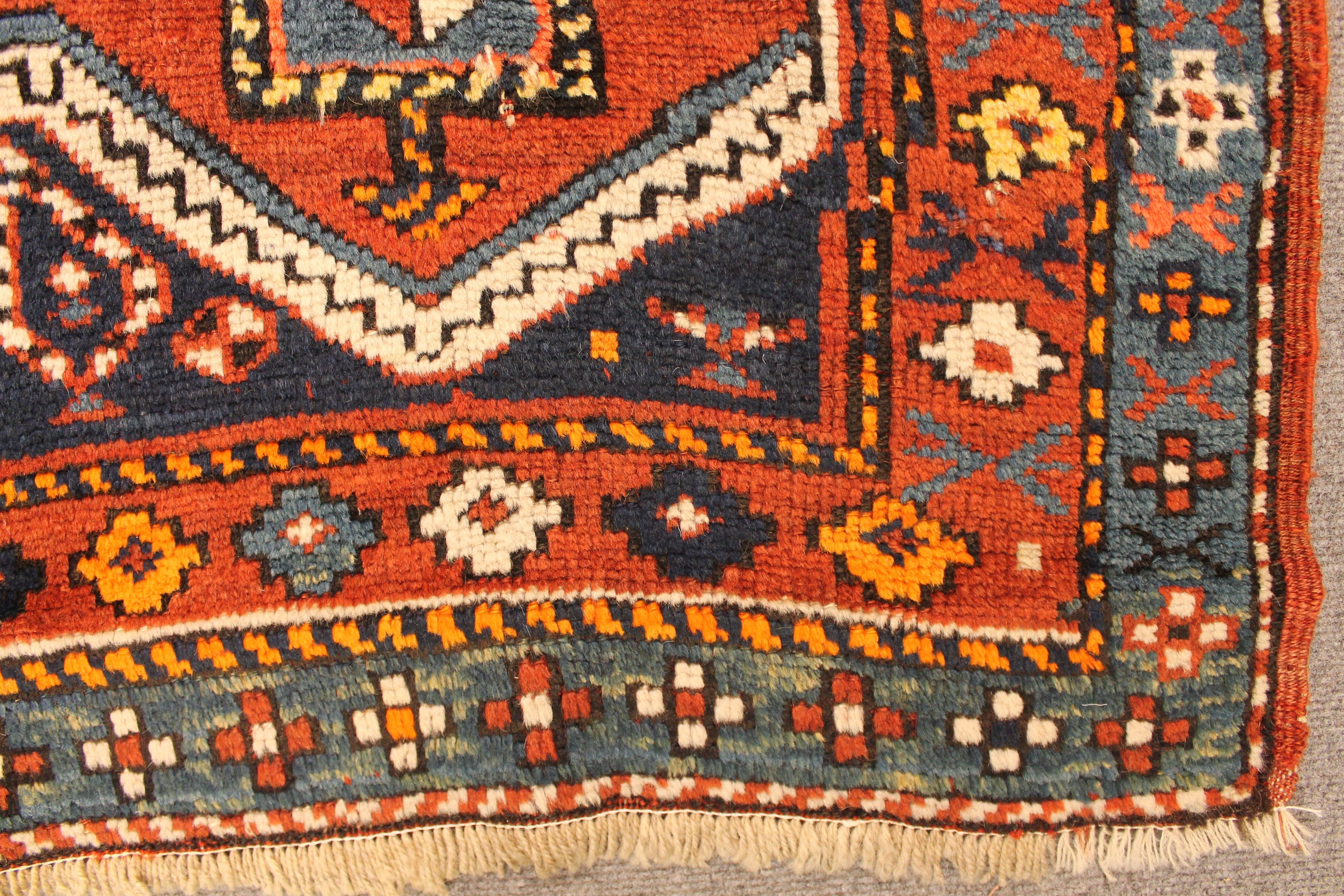 Antique Kazak rug