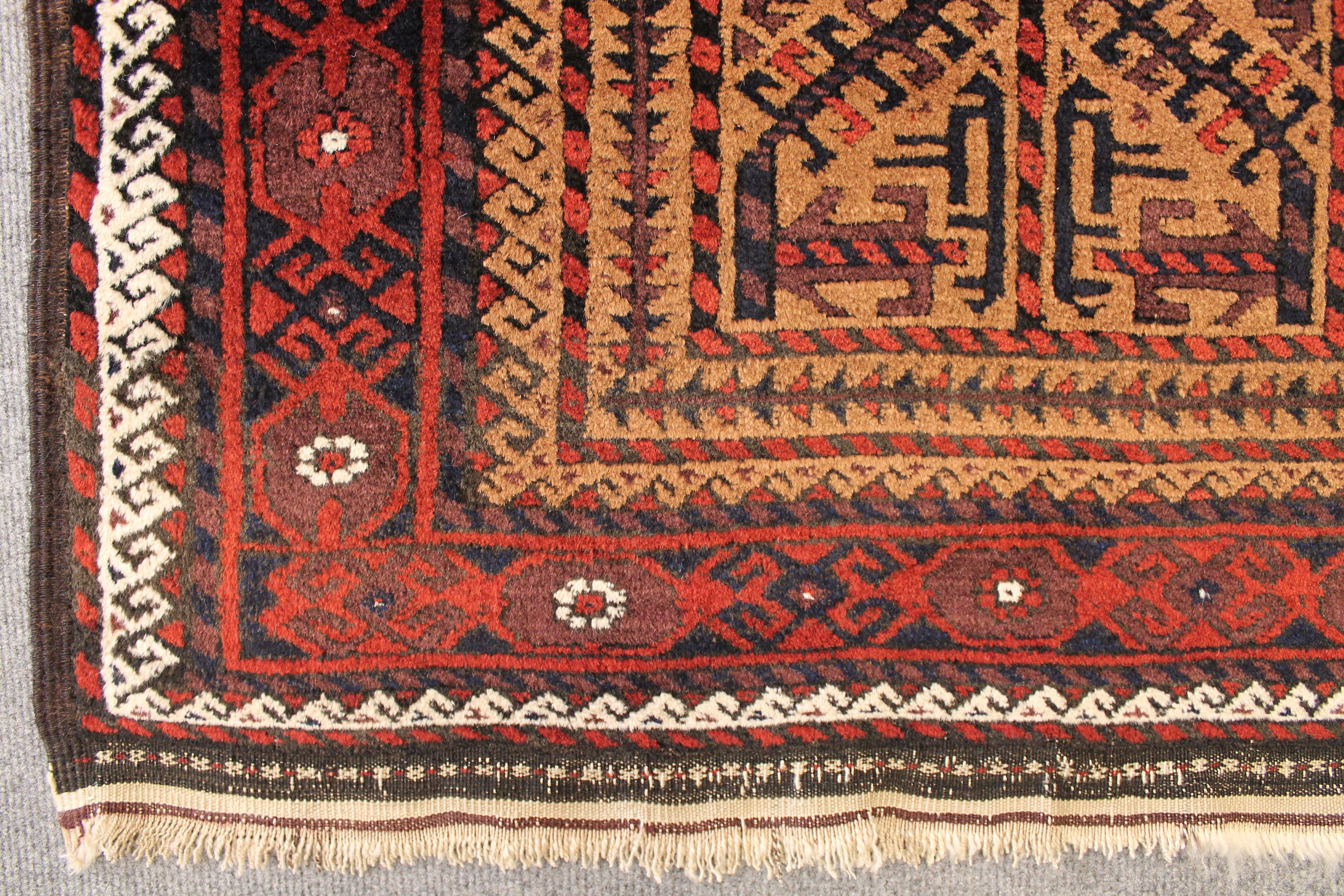 Antique Baluch rug