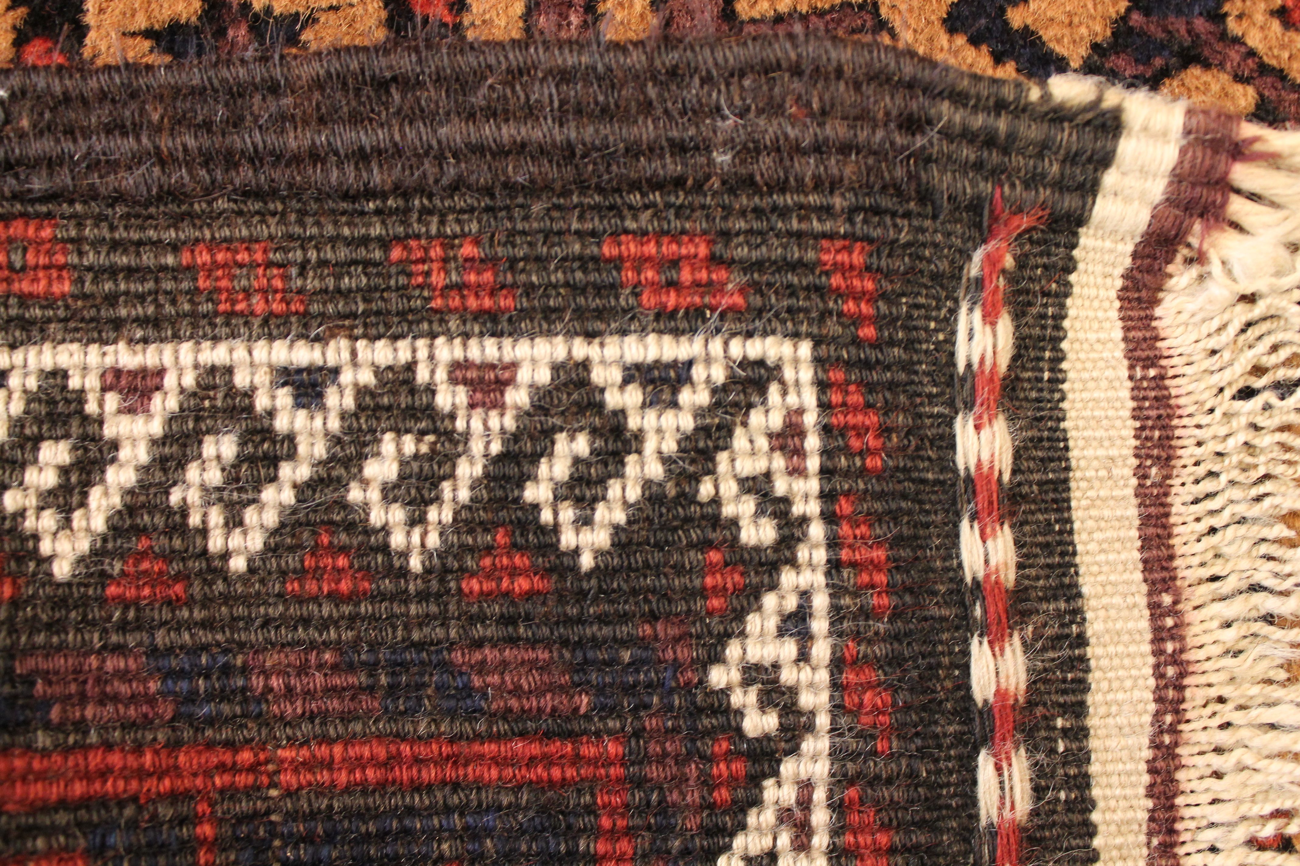 Antique Baluch rug