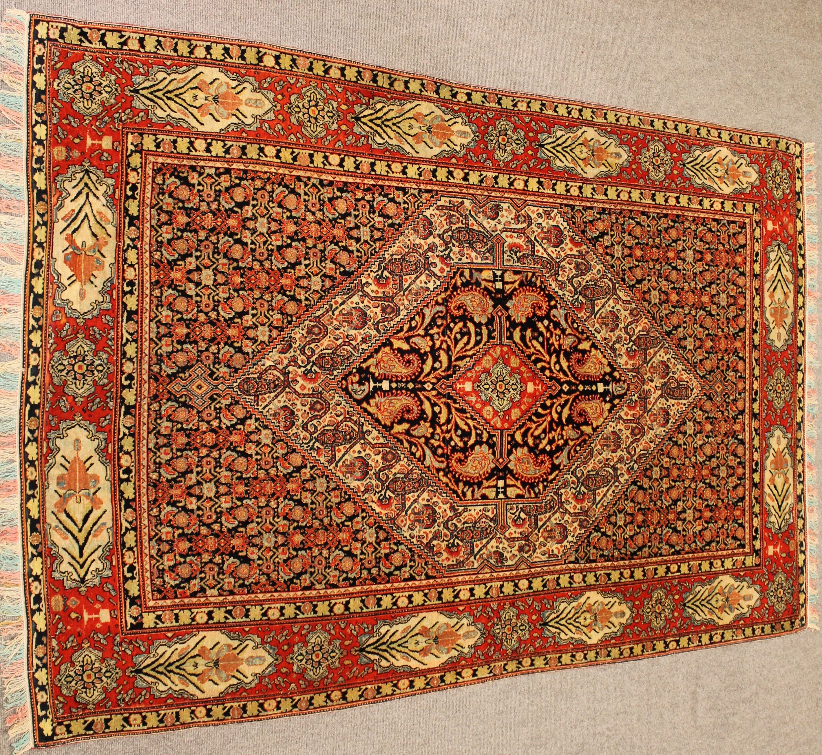 Antique Senneh rug