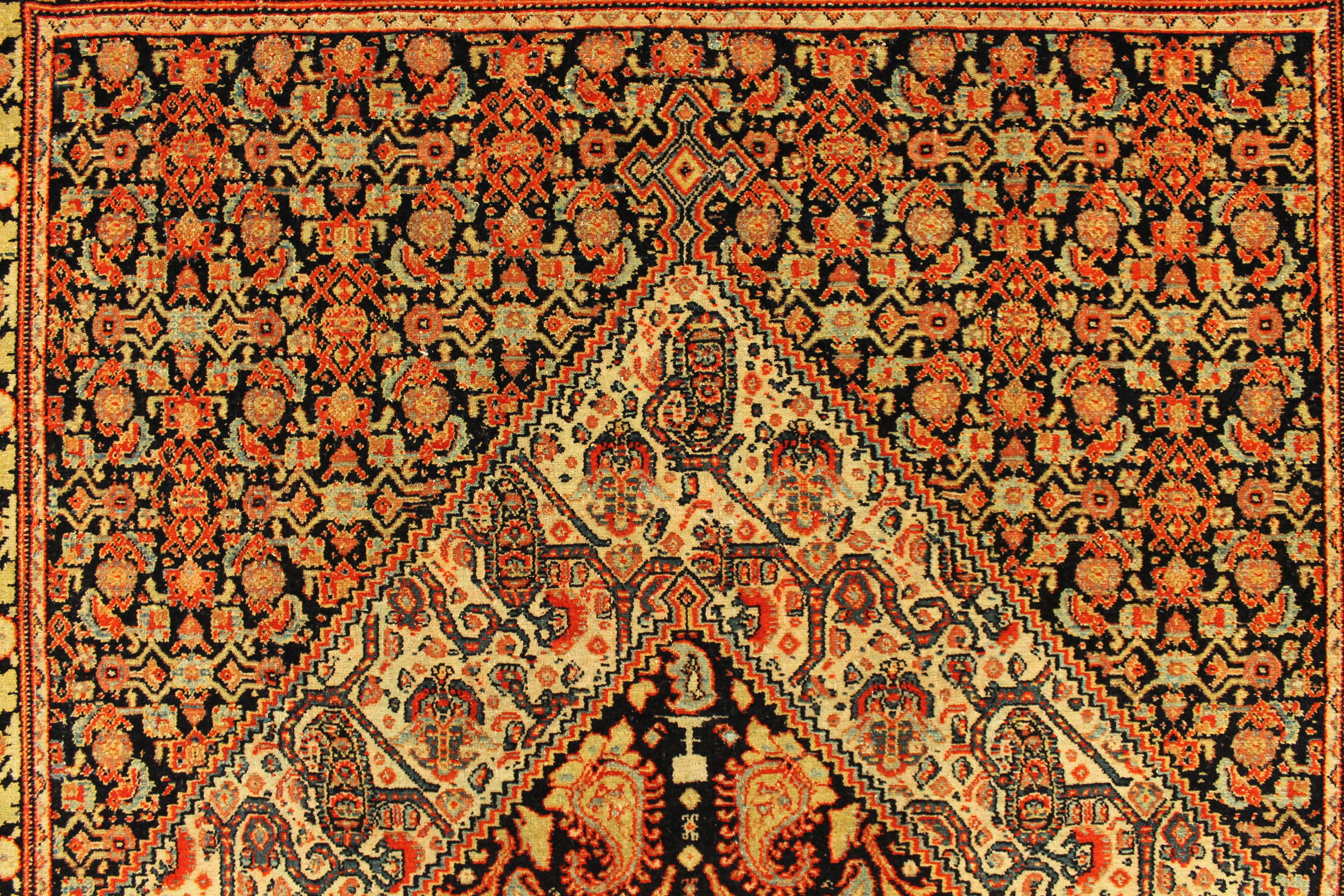 Antique Senneh rug