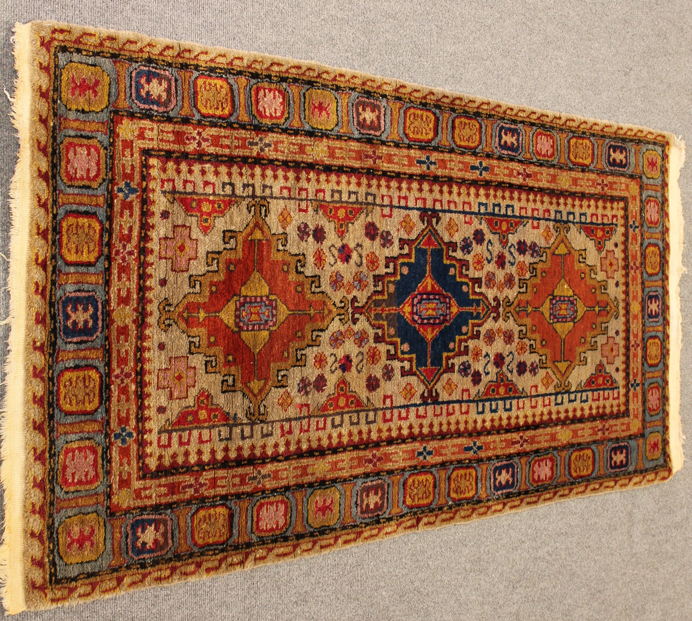 Antique Khotan rug