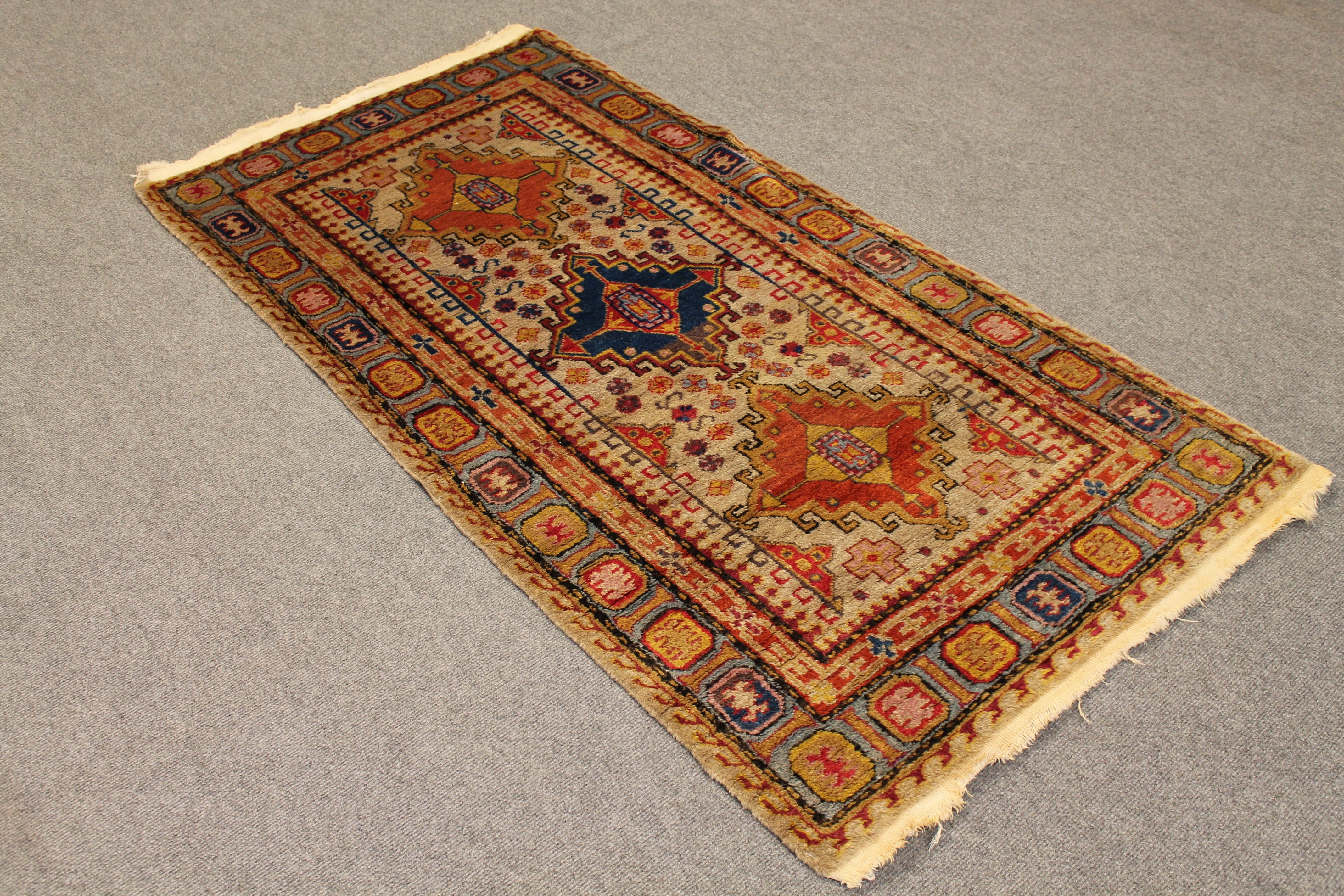 Antique Khotan rug