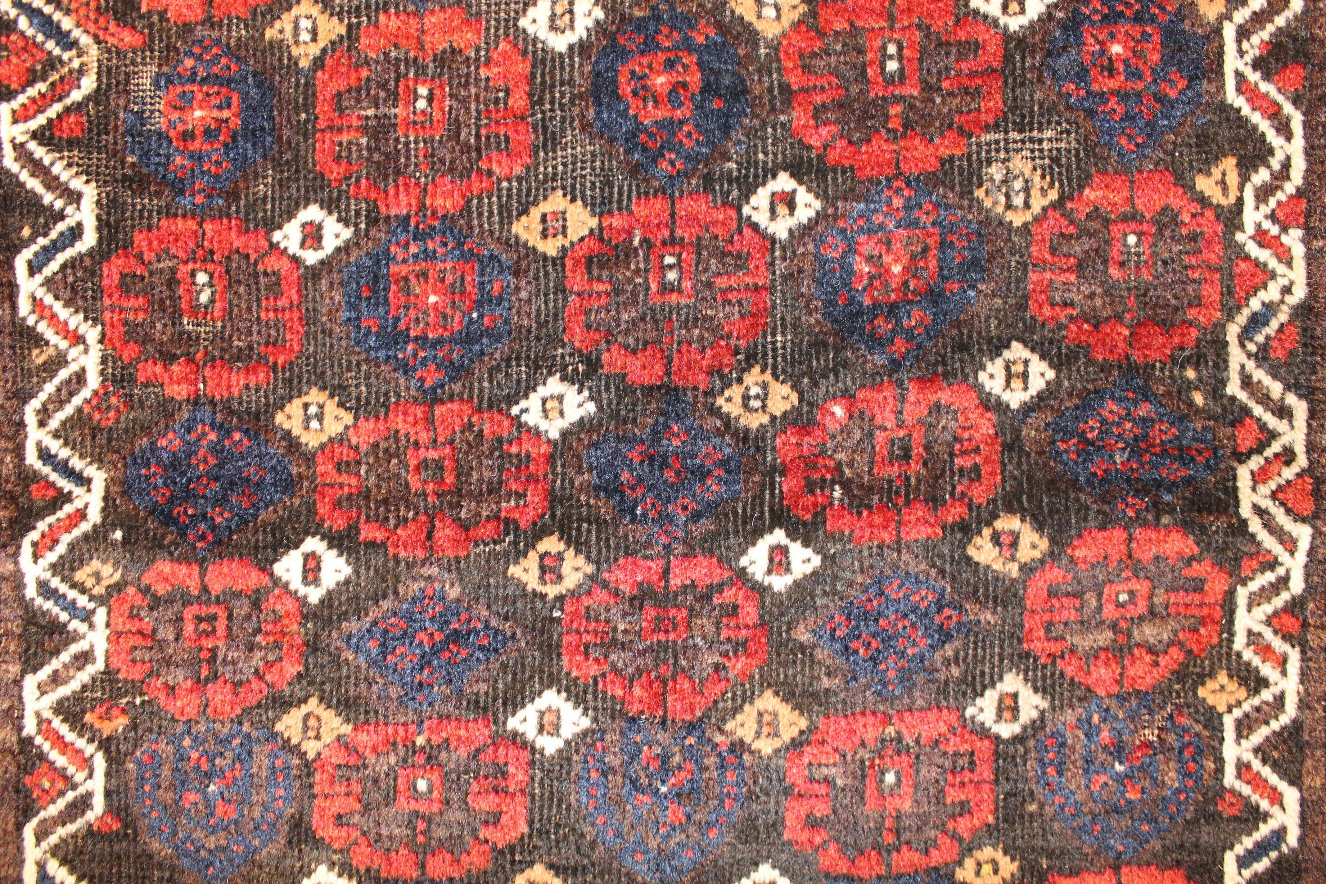 Antique Baluch rug