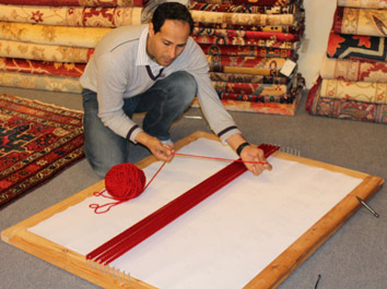 Anas weaving the St George Flag design 2012.jpg Anas weaving the St George Flag design 2012.jpg