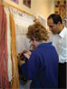 Anas helps Schools weave at The Oriental Rug Gallery ltd