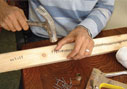 Anas setting up the weaving loom