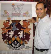 Anas weaving Haslemere Coat of Arms at The Oriental Rug Gallery