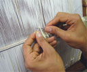 Anas weaving a kilim flat weave